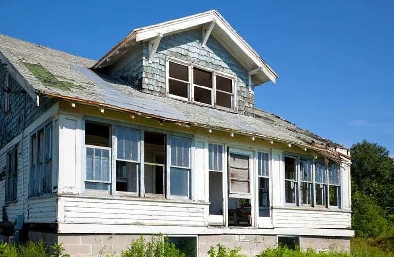 Dilapidated fixer-upper house
